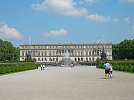 Herren Chiemsee Palace with all the fountains on from the frontside.