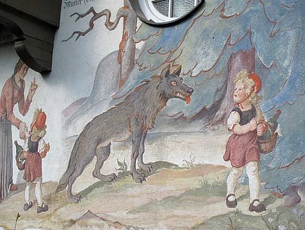 Little Red Riding Hood Meets the wolf! Traditonal Open air housepainting.